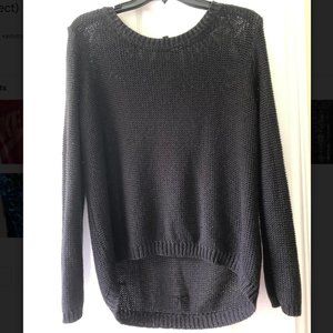 Divided black sweater